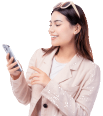 Girl smiling while looking at her cell phone.