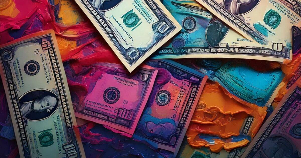 U.S. dollar bills on a colorful, textured paint background.